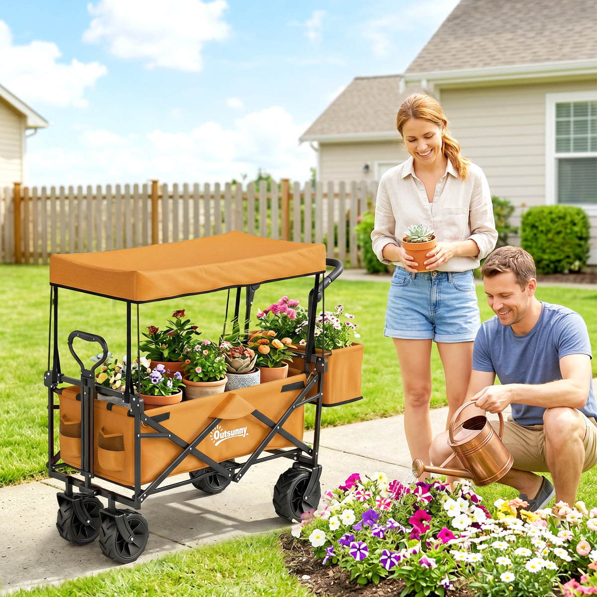 Orange canopy wagon carrying potted plants in a garden