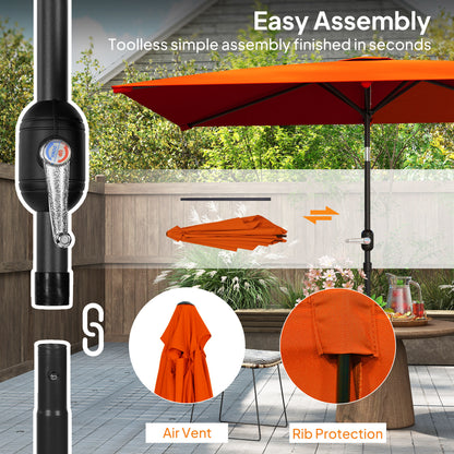 Orange garden parasol with crank, air vent and rib protection details