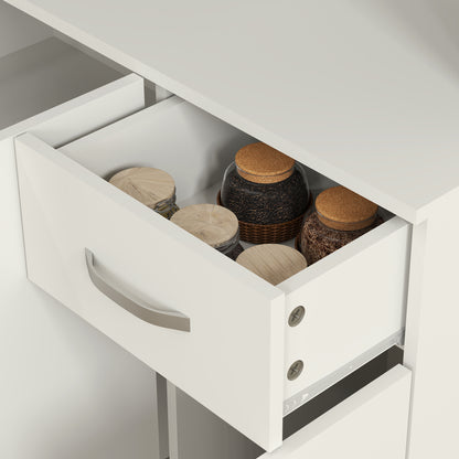 Open drawer in a white pantry cabinet with jars inside