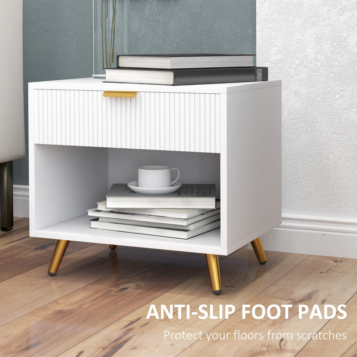 White bedside table with fluted drawer, open shelf, gold-tone legs, and nonslip foot pads