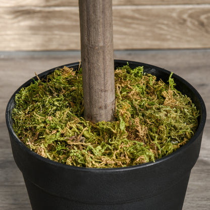 Artificial tree trunk set in moss inside a black pot