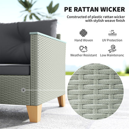 Close-up of light gray woven rattan sofa arm, charcoal cushion, and wood-look leg