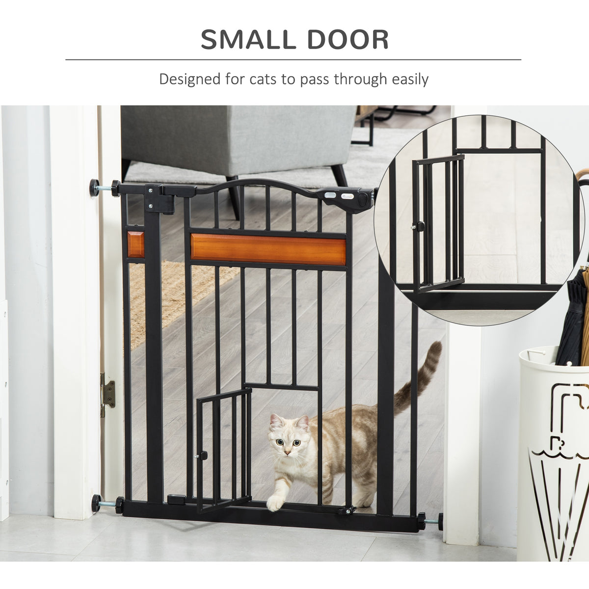 Black pet gate with a small cat door, shown installed in a doorway