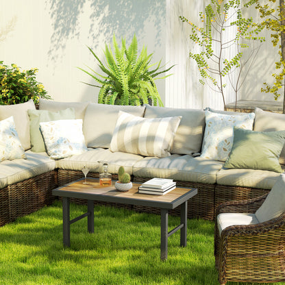 Outsunny outdoor coffee table with woodgrain top beside wicker patio seating
