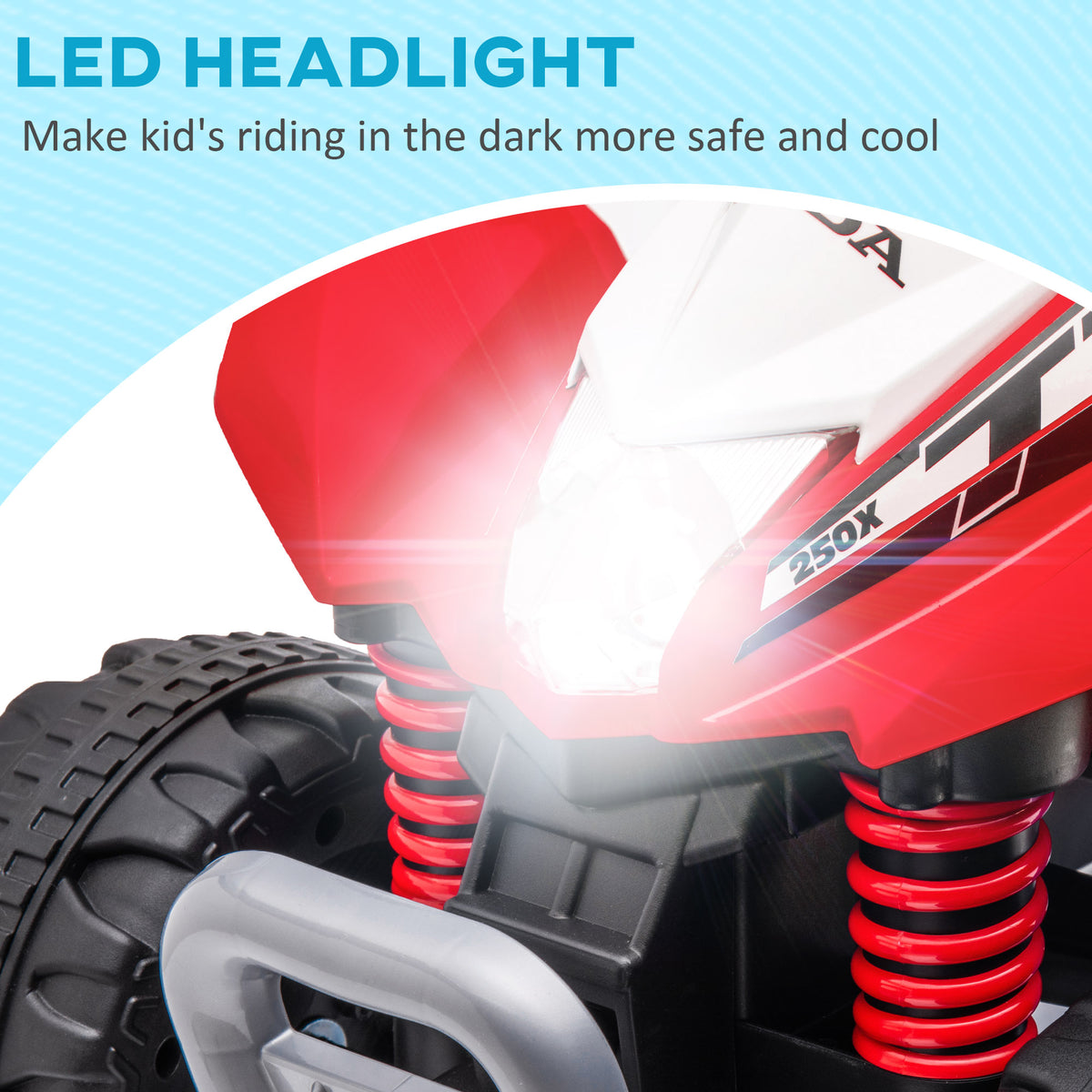 Close-up of the red quad bike's LED headlight and front suspension springs