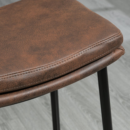 Close-up of the brown textured seat upholstery and stitched edge