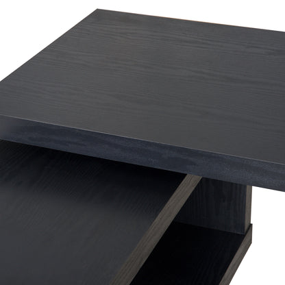 Close-up of the black wood-grain desktop and matching shelf surface.