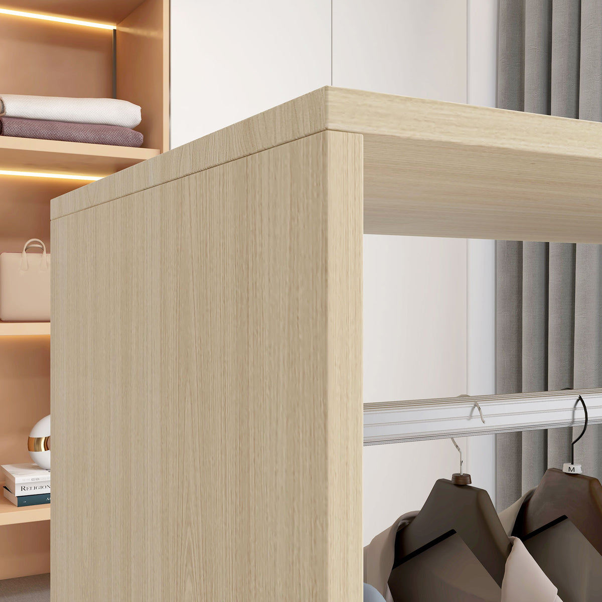 Close-up of the natural wood wardrobe frame, metal hanging rail, and clothes hangers