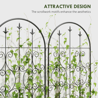 Close view of arched metal trellis panels with decorative scrollwork and climbing vines