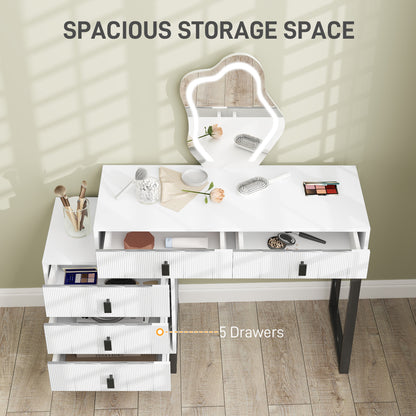 Overhead view of the vanity desk with five drawers open to show storage space.