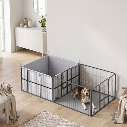 Gray fabric-lined dog whelping box connected to a black metal playpen