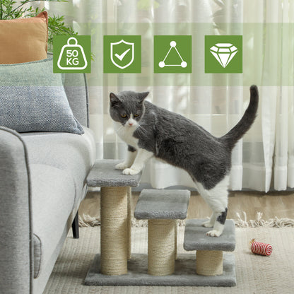 Three-step gray pet stairs with sisal posts, shown beside a sofa as a cat climbs.