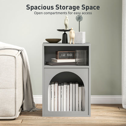 Grey bedside table with books in its arched lower compartment