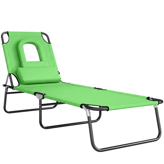 Photo of Outsunny Folding Sun Lounger with Face Hole, 4-Position Adjustable Backrest Garden Recliner Chair Sunbed, Outdoor Lounge Chair with 600 D Oxford Cloth Seat, Pillow for Beach, Green in Green colour on a white background