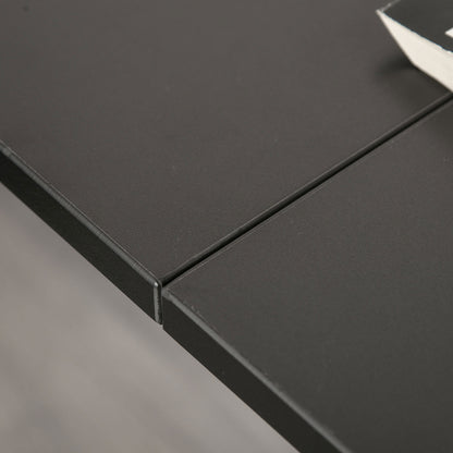 HOMCOM desk close-up showing the black melamine surface and joined tabletop edges