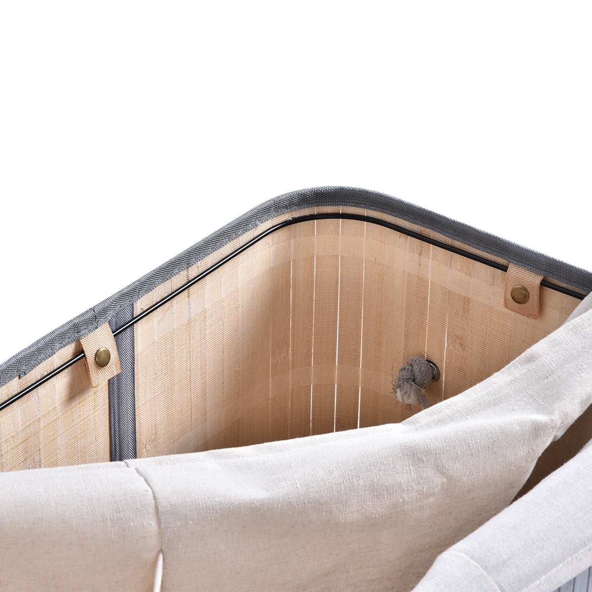 Laundry hamper interior showing the removable fabric liner and snap fasteners