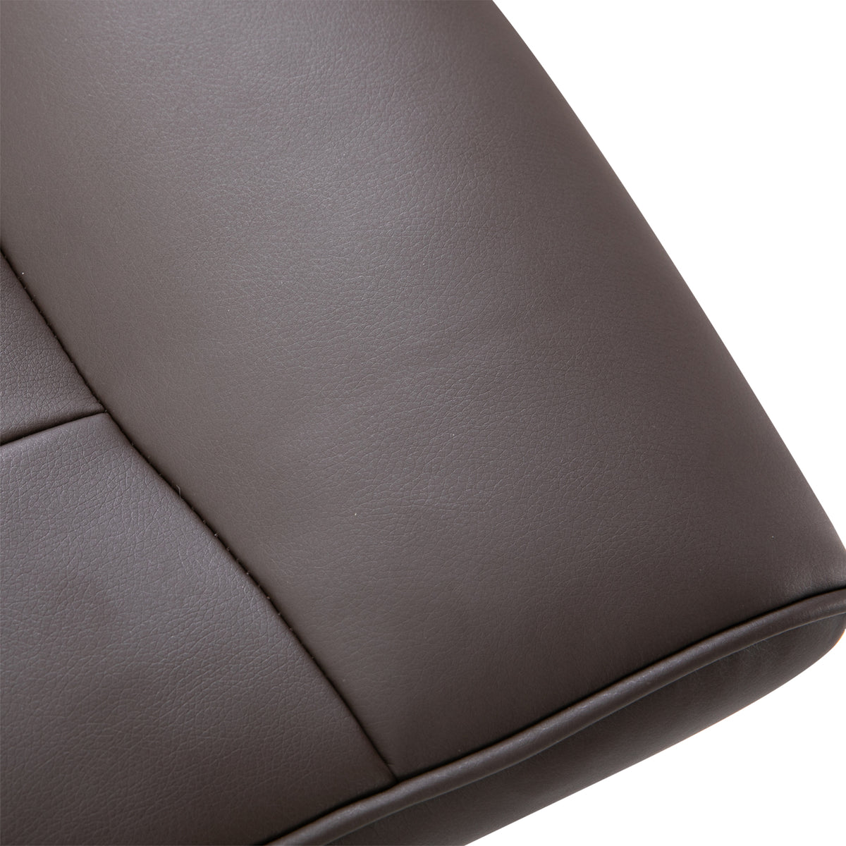 Close-up of the brown recliner chair's textured upholstery and stitched seam