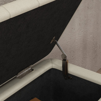 Close-up of the open ottoman's metal lid hinge and support mechanism