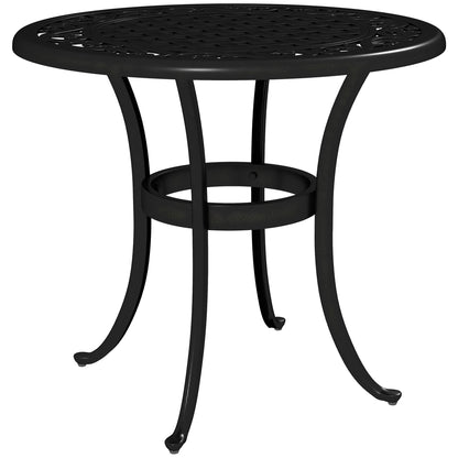 Black cast aluminum garden table with round ornate lattice top and curved legs