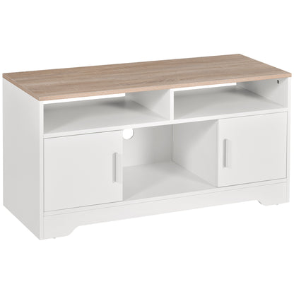 White TV stand with wood-look top, two open shelves, central open compartment, and two cabinet doors.