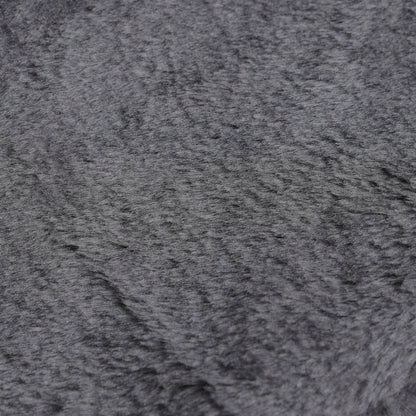 Close-up of the dark gray plush stair cover's soft, textured fabric