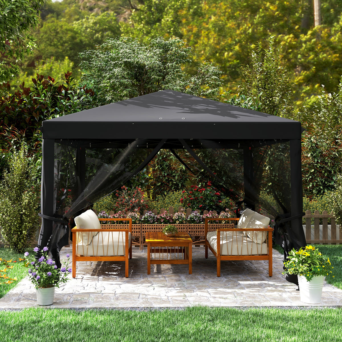 Outsunny black gazebo with mesh curtains tied back around patio seating