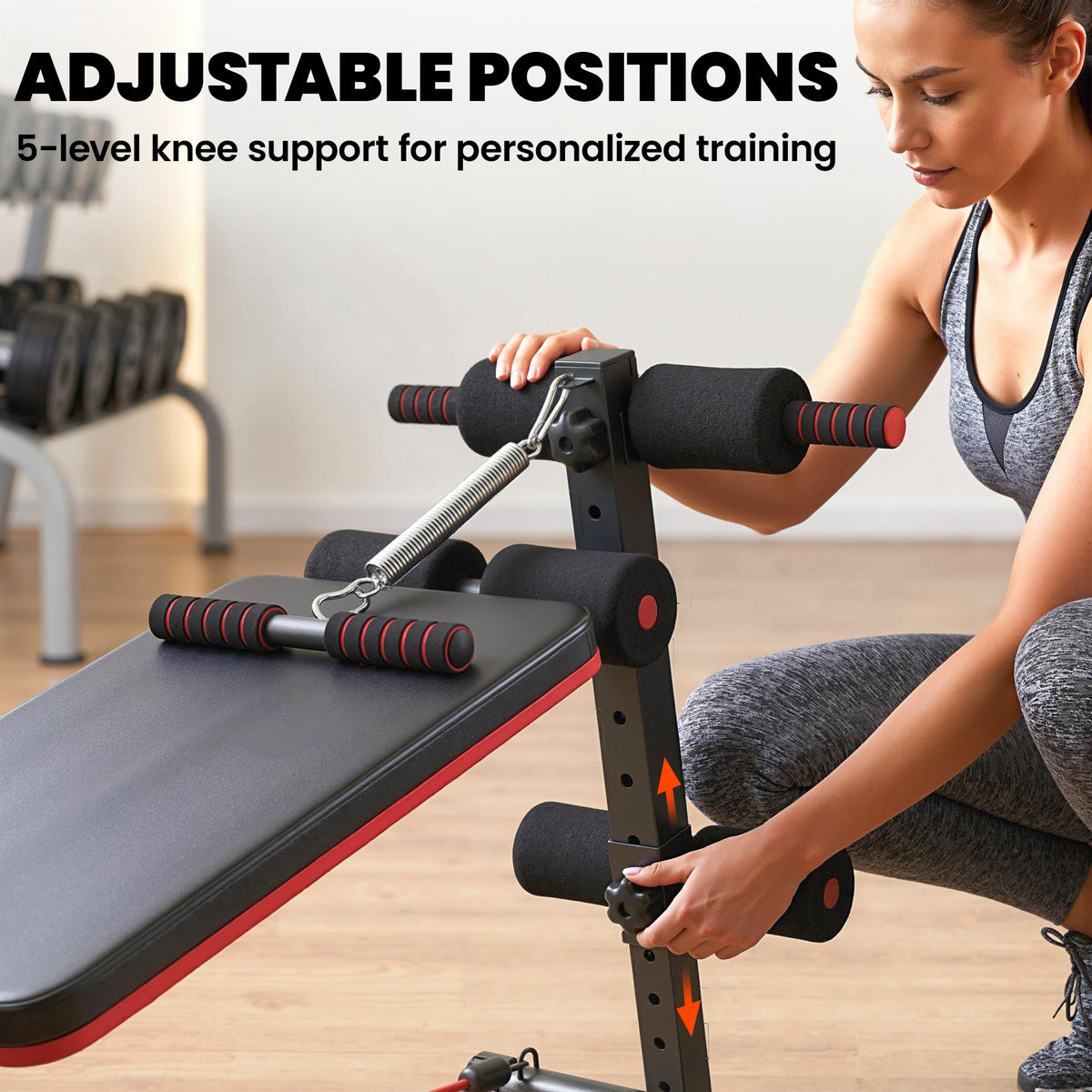 HOMCOM sit-up bench with adjustable padded knee supports and spring tensioner