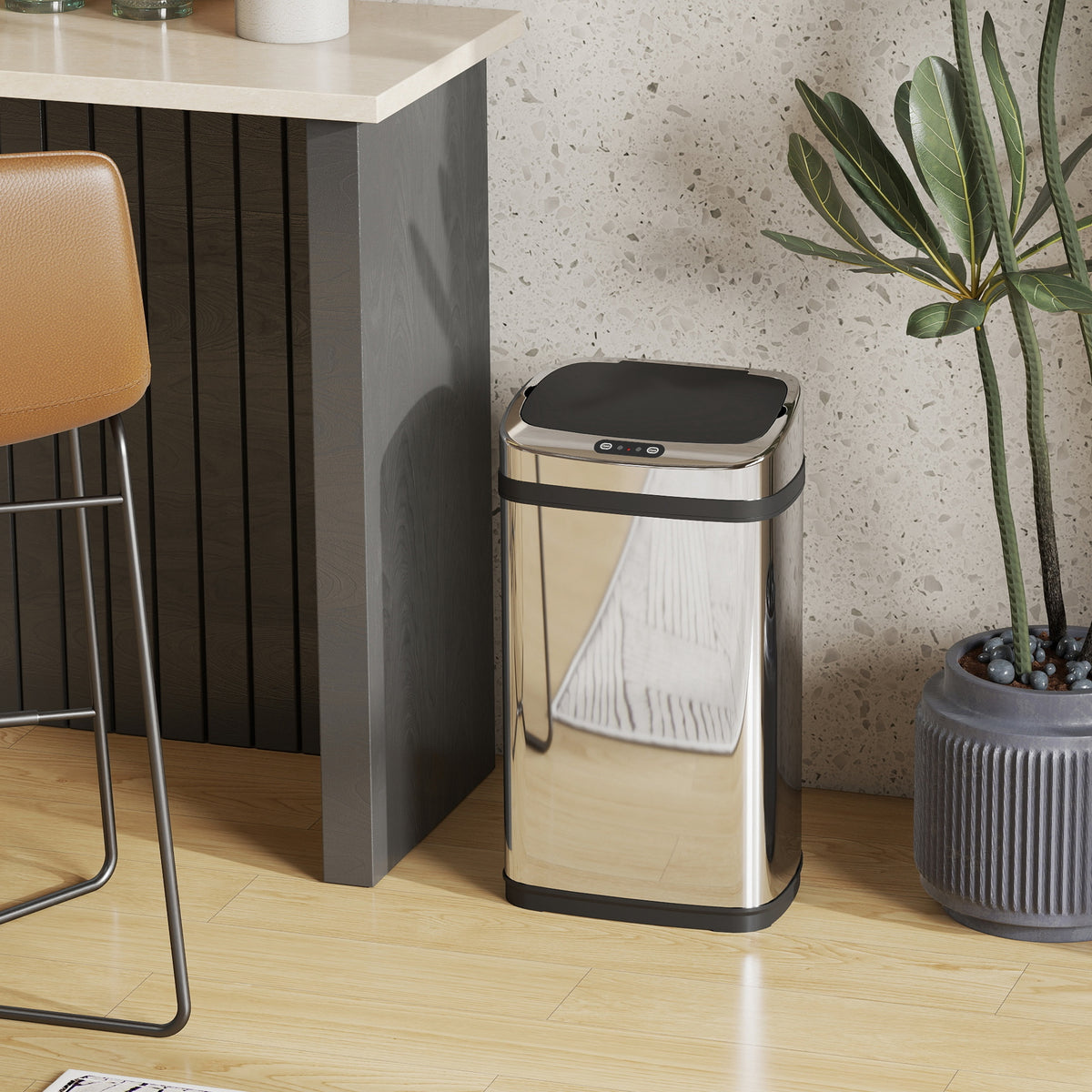 Stainless steel sensor bin with closed lid and black trim