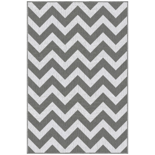 Rectangular outdoor rug with a light gray and white zigzag pattern