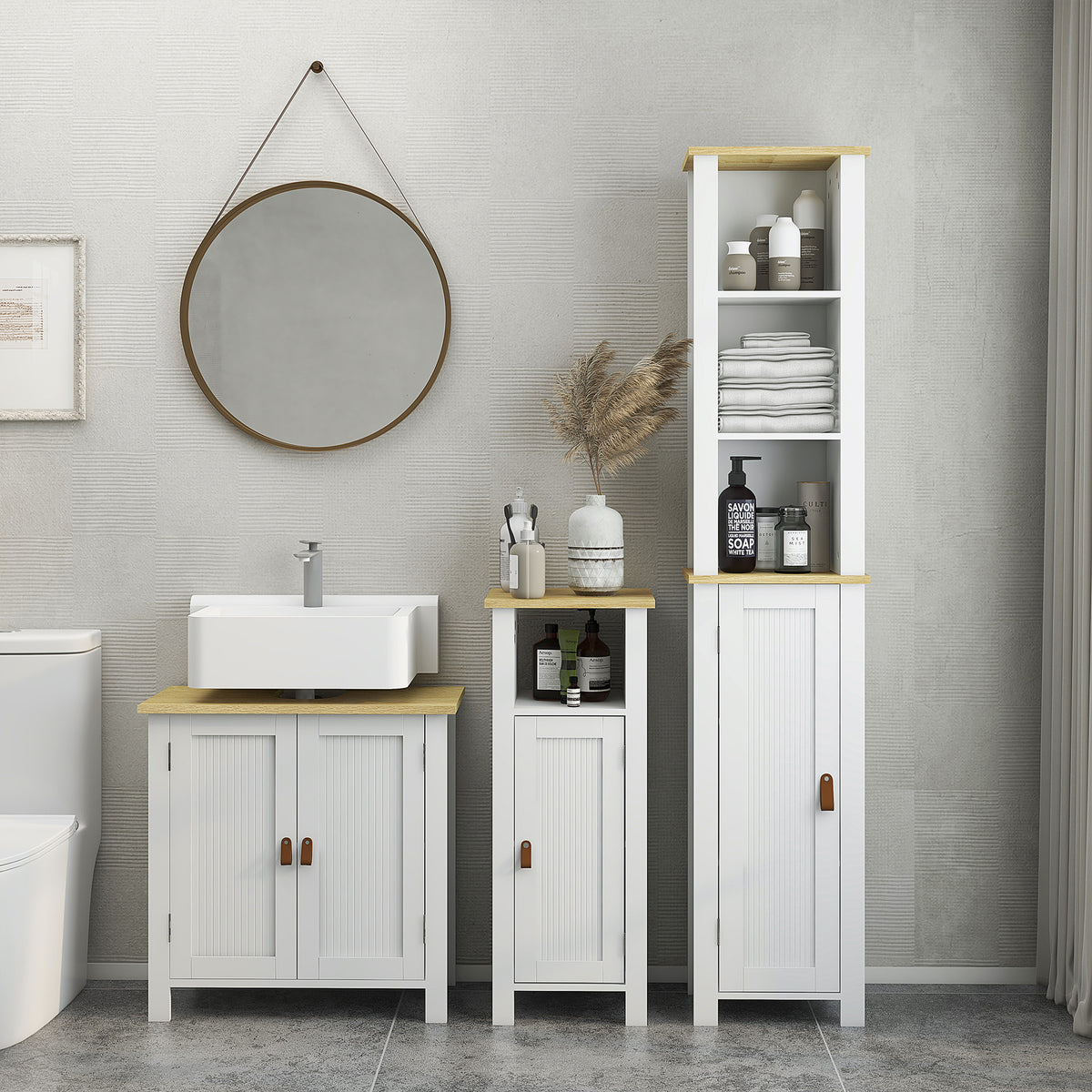White two-door under-sink cabinet with wood-look top, shown with matching bathroom storage units