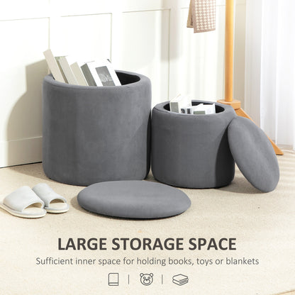 Two grey corduroy storage ottomans with lids removed to show the storage compartments