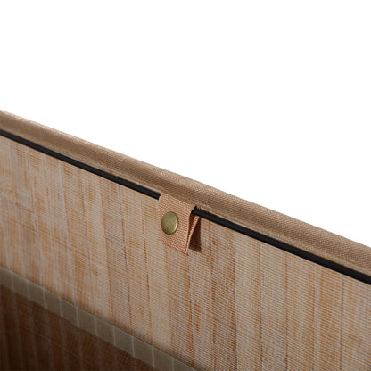 Close-up of a woven fabric hamper edge with a fastening tab