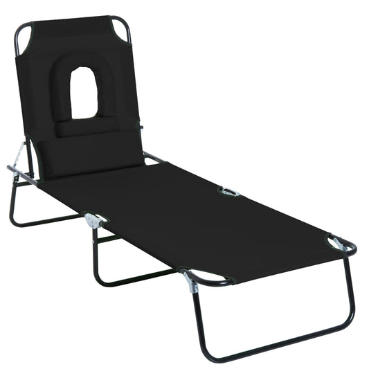 Photo of Outsunny Outdoor Folding Sun Lounger with Face Hole, 4 Level Adjustable Backrest Reclining Garden Lounger, Garden Recliner Sunbed with 600 D Oxford Cloth Seat and Pillow for Beach, Black in Black colour on a white background