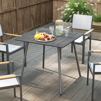 Outsunny grey slat-top garden table shown with patio chairs