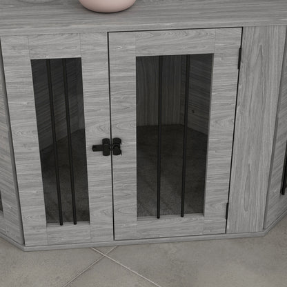 Close-up of the grey dog crate doors, black latch, and vertical ventilation slats