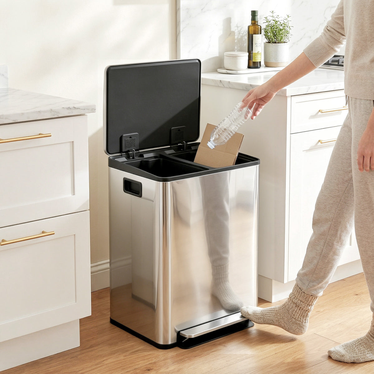 HOMCOM dual-compartment bin with its lid open and foot pedal in use