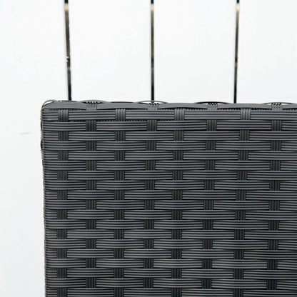 Close-up of the black rattan weave along the bench backrest