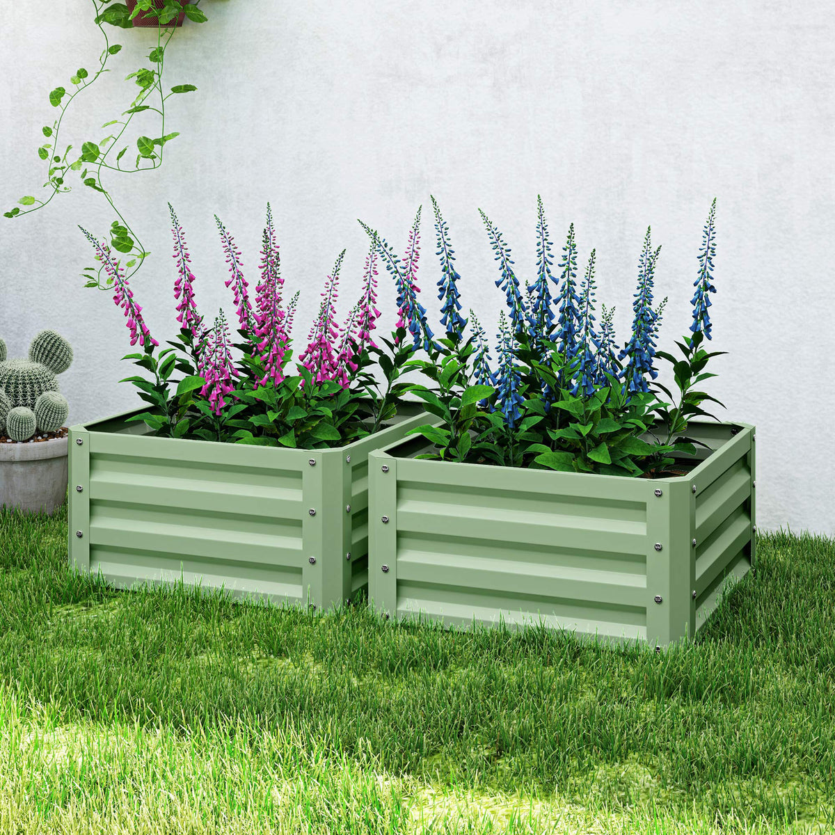Pair of light green steel planter boxes filled with pink and blue flowers