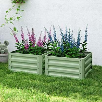Pair of light green steel planter boxes filled with pink and blue flowers