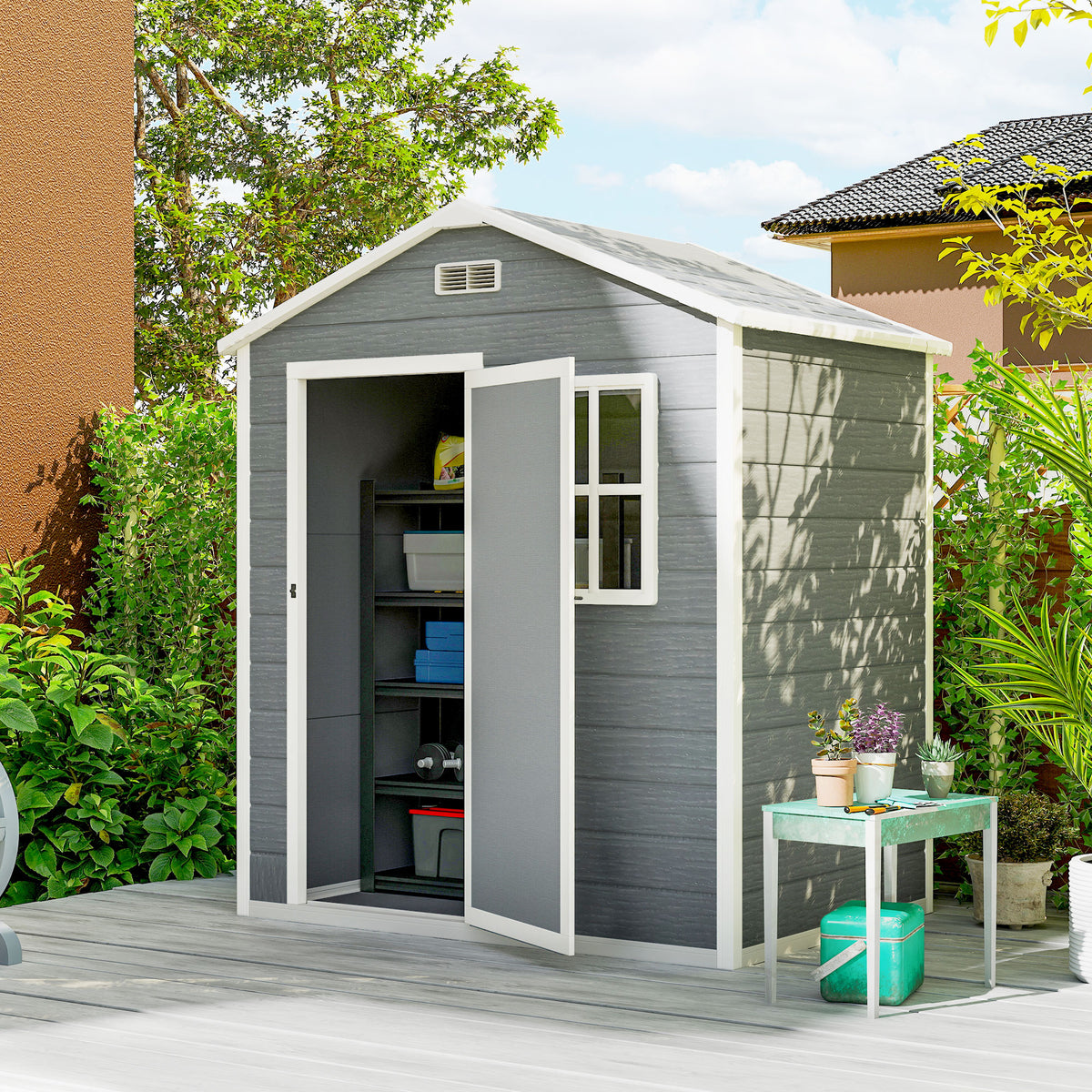 Grey resin garden shed with open door revealing storage shelves and a side window