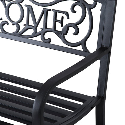 Close-up of the bench’s curved armrest, slatted seat, and ornate steel backrest