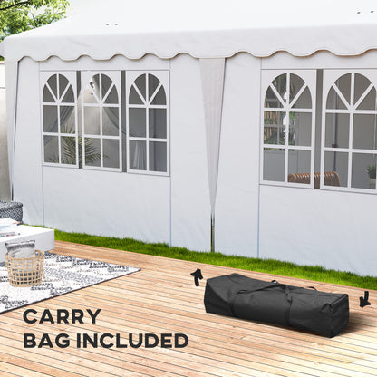 White gazebo with windowed side panels beside its black carry bag