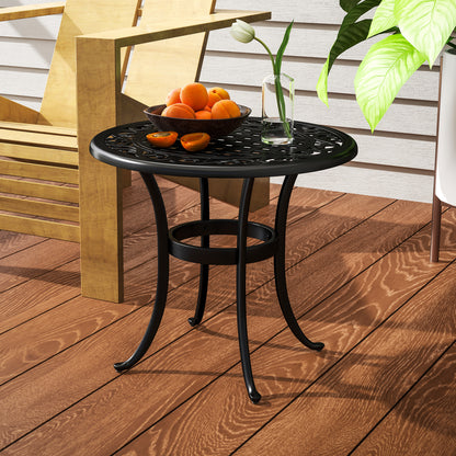 Black round patio table with decorative lattice top and curved legs