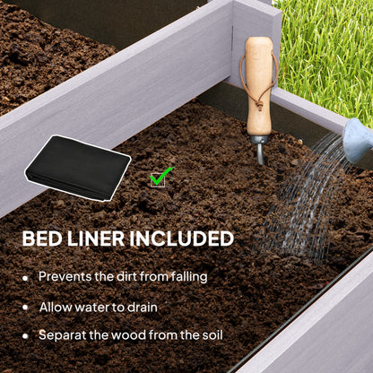 Grey raised planter with soil, drainage liner, and corner joints