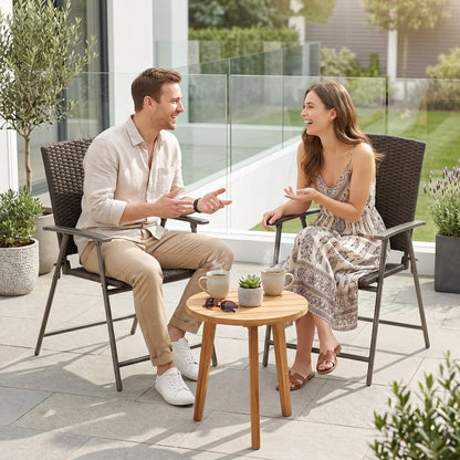 Brown rattan folding chairs with metal frames and armrests, shown in use