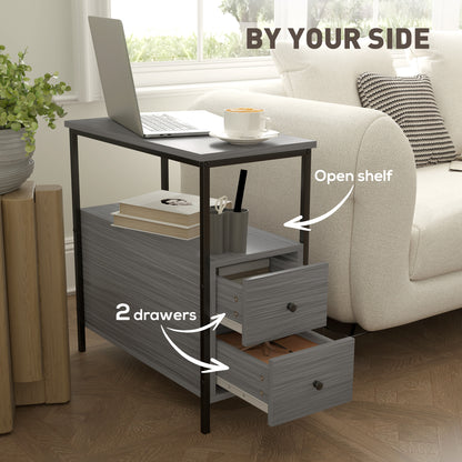 Grey wood-grain side table with two open drawers and an open shelf beside a sofa
