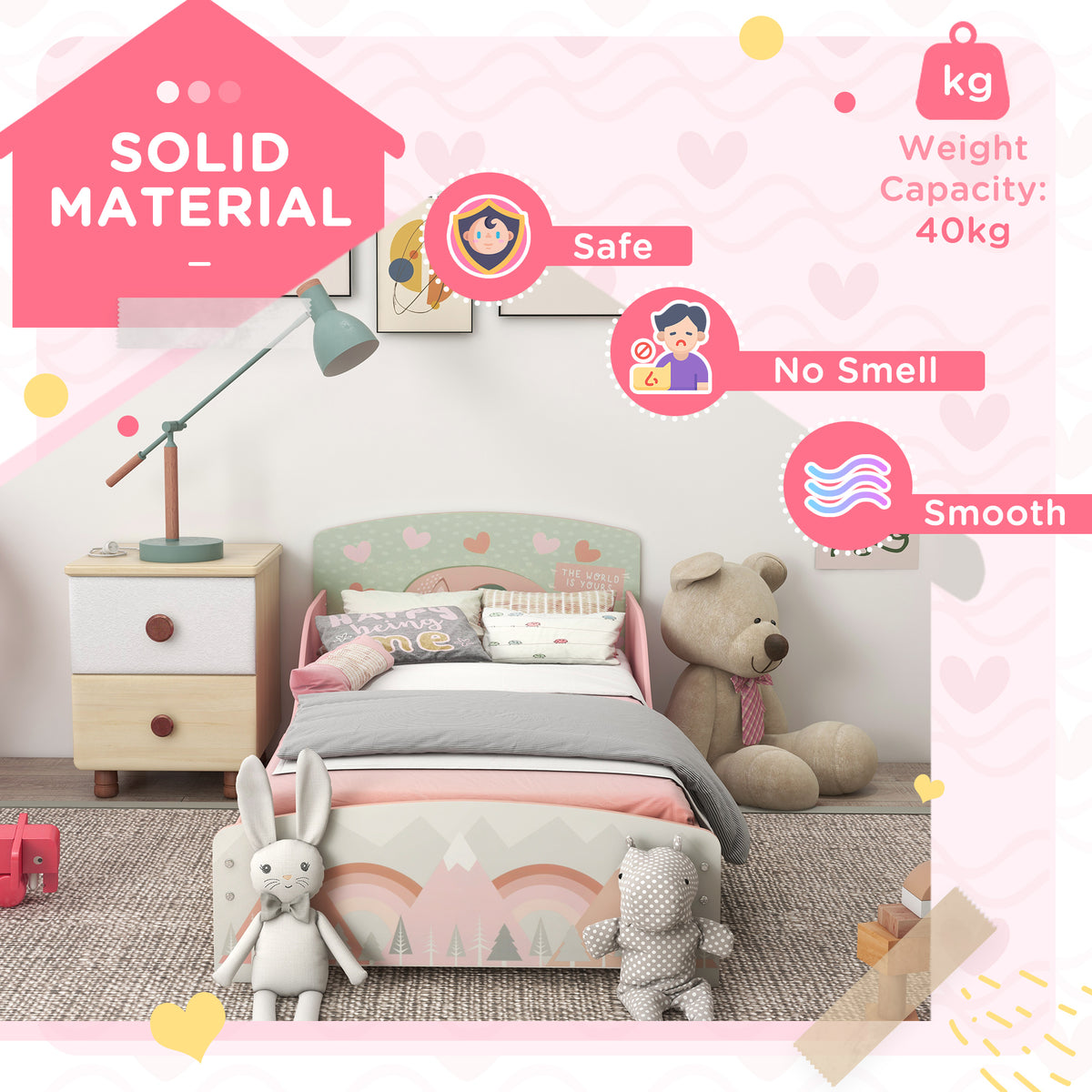 Pink toddler bed with mountain-print footboard and heart-decorated headboard