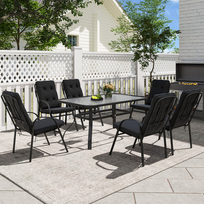 Seven-piece black patio dining set with glass-top table and six cushioned chairs