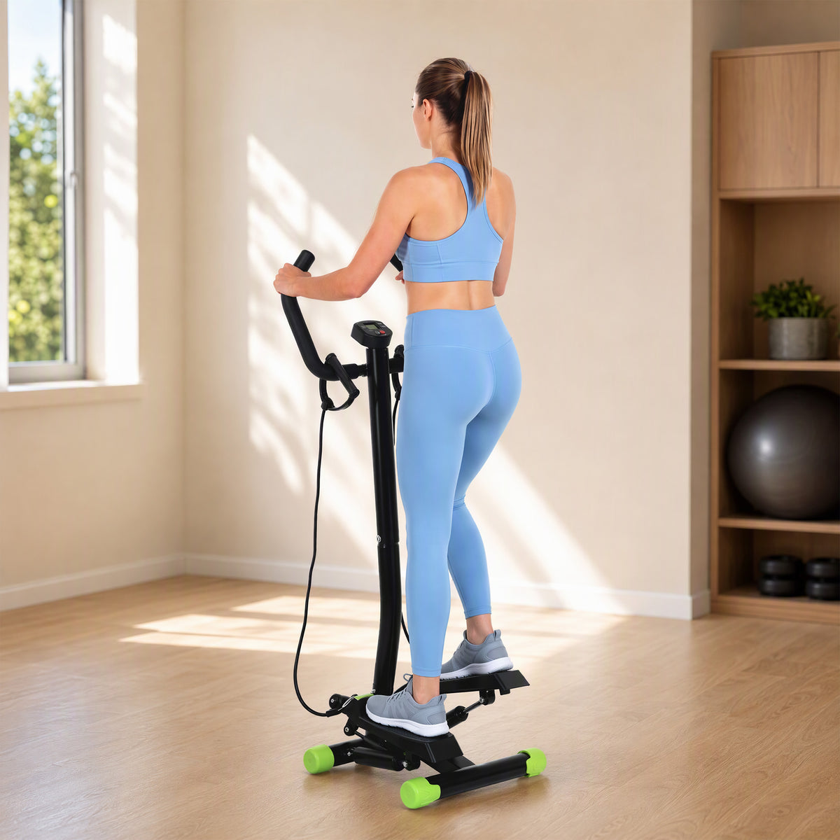 HOMCOM stepper with handlebar and resistance bands shown in use from behind