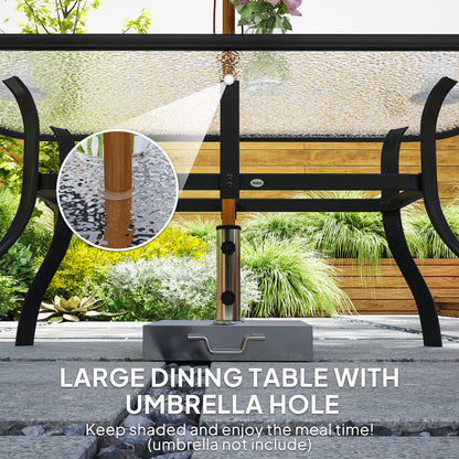 Black dining table with textured glass top and umbrella hole